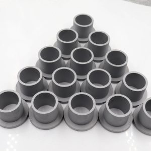 Tungsten carbide bushing and sleeve